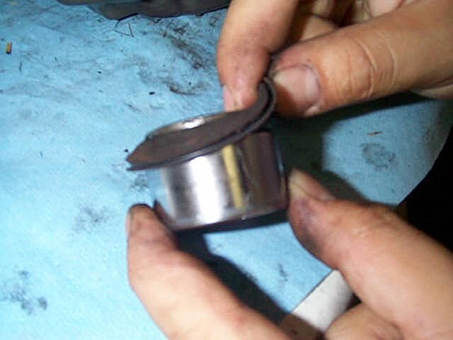 Caliper piston boot removal